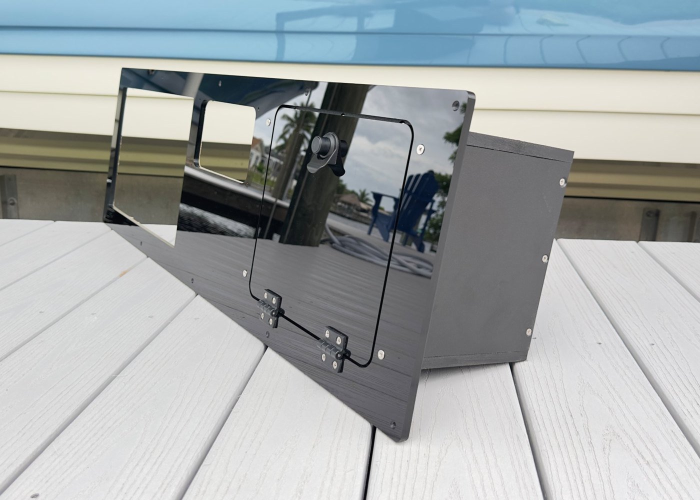 Custom black acrylic dash panel with electronics cutouts and glove box