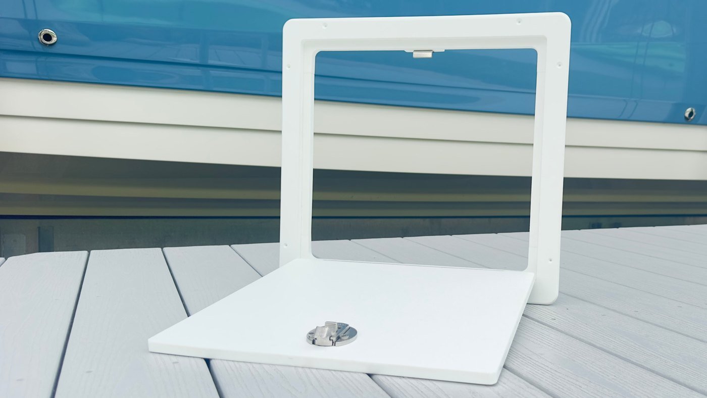 Tarpon Bay Marine hatch open, showing the frame and the back of the door